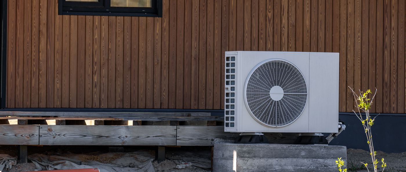 Air-source heat pump unit installed outside a home